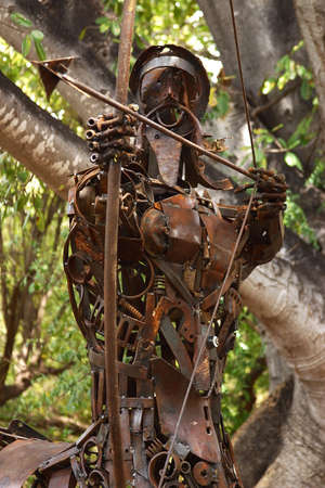 detail view of an original oxidize sculpture of a centaur in front of a tree in Alamos, Sonora, Mexico, Latin Americaの写真素材