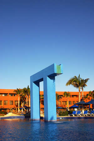 partial view of a pool with a cascade of a hotel at Los Cabos, Baja California, Mexico, Latin Americaの写真素材