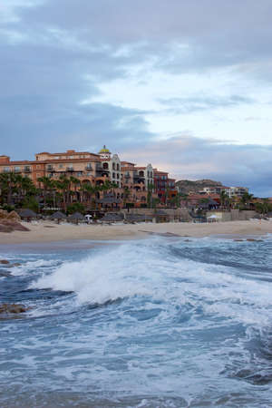 stormy wave and hotels at the beach of Los Cabos, Baja California, Mexico, Latin Americaの写真素材