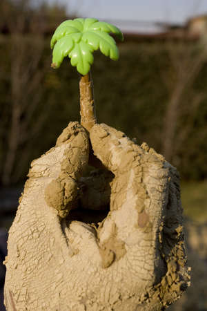 hands in action in order to clean our planetの写真素材