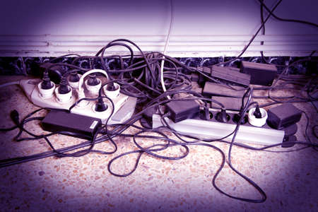 computer cable clutter at homeの写真素材