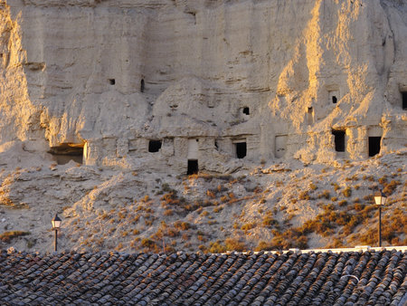 Old houses in caves in the mountains of the Biosphere Reserve Bardenas in Navarra, Spainの写真素材
