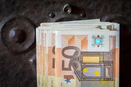 Euros in front of an old arcadeの写真素材