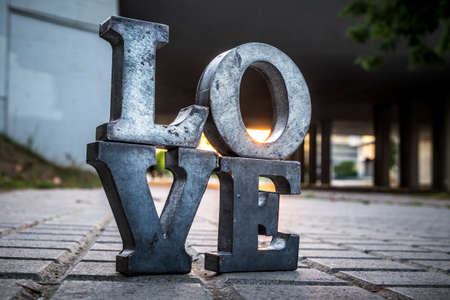 Love sign with metal letters in a street of Spainの写真素材