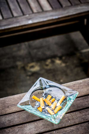 CIGARETTE STUBS LYING in a countryside LOCATION spainの写真素材
