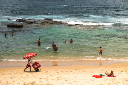 Salvador, Brazil - October 27, 2016: people enjoying Farol de Barra beach, one of the most popular in Salvadorのeditorial素材