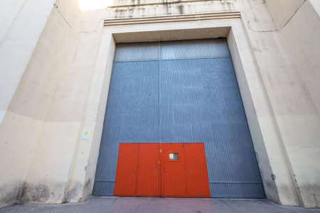 Barcelona, Spain - April 04 2017: door in an industrial building in Montjuic areaのeditorial素材