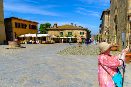 Monteriggioni, Italy - May 9, 2014: turist in Monteriggioni in spring Tuscany Italyのeditorial素材