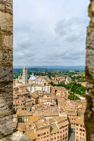 Siena, Italy - May 11, 2014:  The Duomo and Campanile view from the Torre del Mangia of Palazzo Pubblico  Siena, Tuscany, Italyのeditorial素材