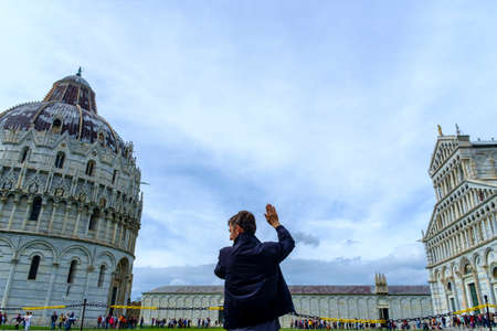Pisa, Italy - May 11, 2014:  Piazza dei Miracoli with tourist in a spring dayのeditorial素材
