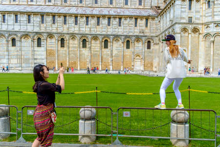 Pisa, Italy - May 11, 2014:  Piazza dei Miracoli with tourist in a spring dayのeditorial素材