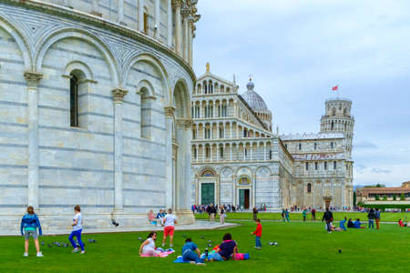 Pisa, Italy - May 11, 2014:  Piazza dei Miracoli with tourist in a srping dayのeditorial素材