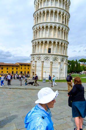 Pisa, Italy - May 11, 2014:  Tourists in front of the Leaning Tower of Pisa Pisa, Tuscany, Italy, Europeのeditorial素材