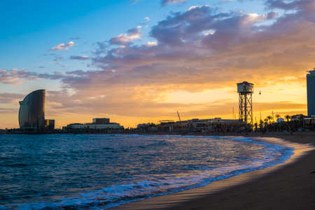 Barcelona, Spain - March 3, 2016: popular beach of Barceloneta during the sunset Mediterranean coast Europeのeditorial素材