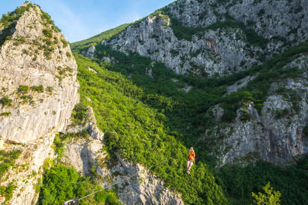 Omis, Croatia - May 31, 2017: Zip line at Canyon of Cetina River near Omis, Croatiaのeditorial素材