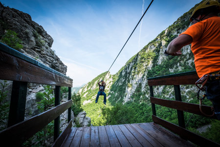 Omis, Croatia - May 31, 2017: Zip line at Canyon of Cetina River near Omis, Croatia
