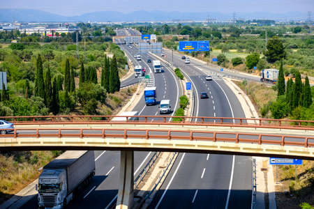 Vilaseca, Tarragona, Spain - May 22, 2018: The AP7 motorway in the vicinity of the city of Vilaseca and the petrochemical complex of Tarragonaのeditorial素材