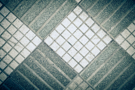 abstract detail with lines and pattern on the sidewalk of a Spanish city