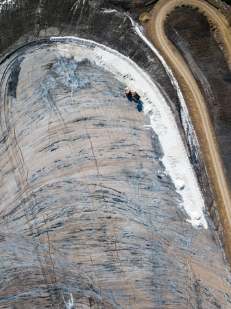 Aerial view of a truck picking up discarded salt from the salt mountain of Cardona, which has caused...