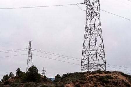 high voltage cable towers in an industrial area in Catalonia