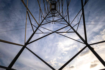 high voltage tower at sunsetの写真素材