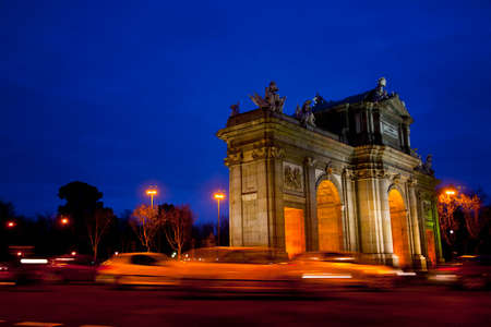 The famous Puerta de Alcala at night in the city of Madrid capital of Spainの写真素材