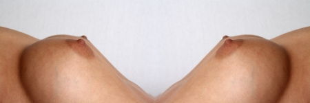 Two pair of female breasts in an abstract rendering Two pair of female breasts in an abstract rendering