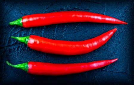Red chili pepper on a dark backgroundの写真素材