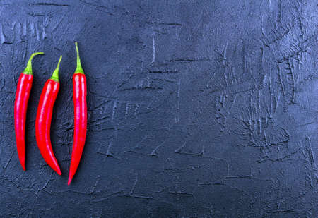 Red chili pepper on a dark backgroundの写真素材