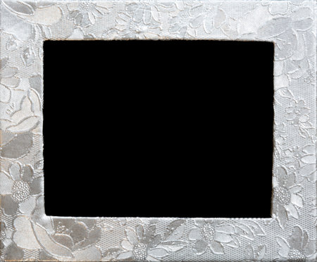 Silver flower embossing. Floral decorative metallic frame. Foil with pattern of flowersの写真素材