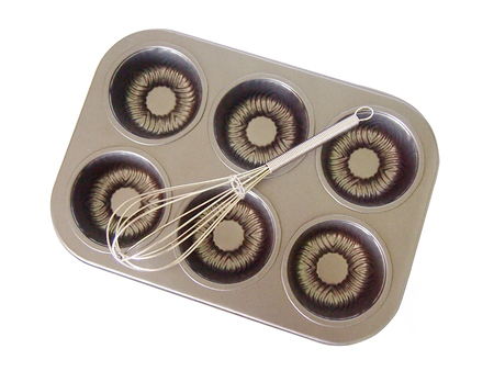 isolated cupcake tray and whiskの写真素材