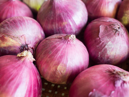 Onions in basket.の写真素材