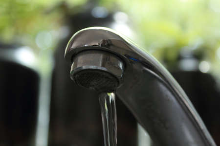 running water from tapの写真素材