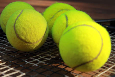 tennis balls and racketsの写真素材