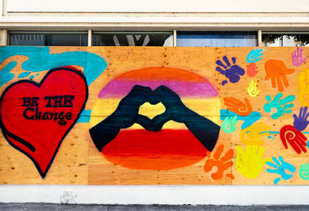 San Diego, California - July 18, 2020 - Boarded up window in downtown San Diego painted with artwork in support of the Black Lives Matter movementのeditorial素材