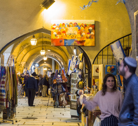 Jerusalem, Israel - 12/15/2019: via dolorosa - main street with shops down to the churches