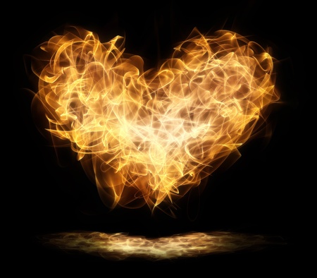 heart in flames against the blacknessの写真素材