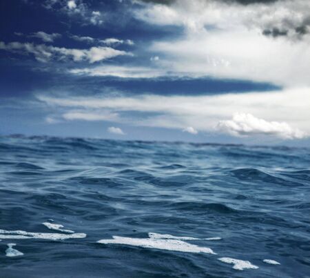 the sea against a cloudy skyの写真素材