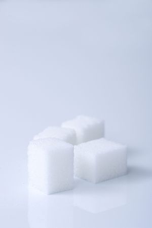 sugar, sugar pieces, sweet, tea, coffee, candy, diabetes, health, good, bad, white, blue, abstract, background,の写真素材
