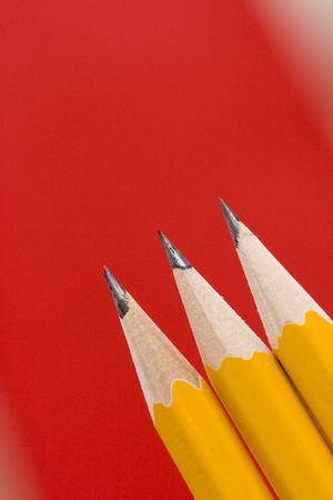 pencils on red backgroundの写真素材