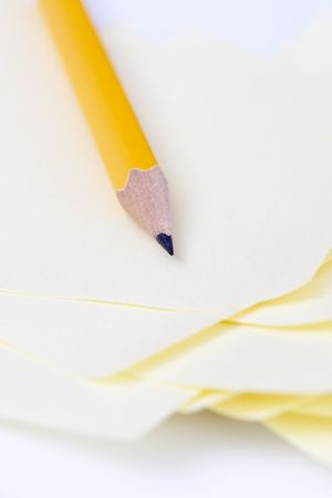 sharp pencil and post it's on the deskの写真素材