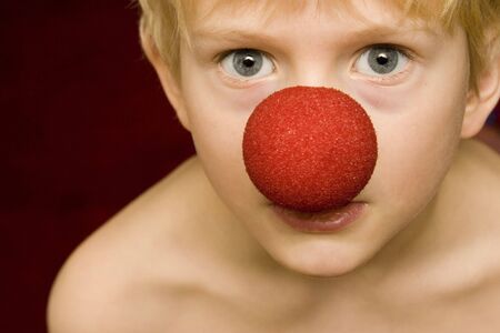 boy with clown noseの写真素材