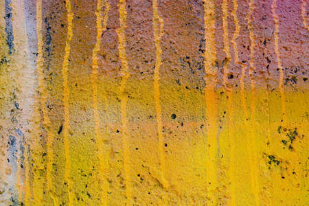 Abstract grunge yellow painted old wall の写真素材