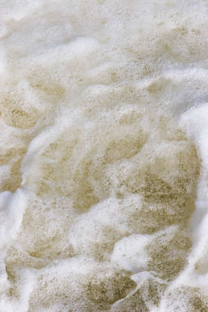 The turbulent water after a waveの写真素材