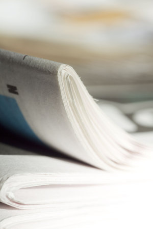 pile of newspapers on the table