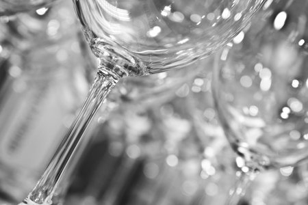 empty clean wine glasses in black and white