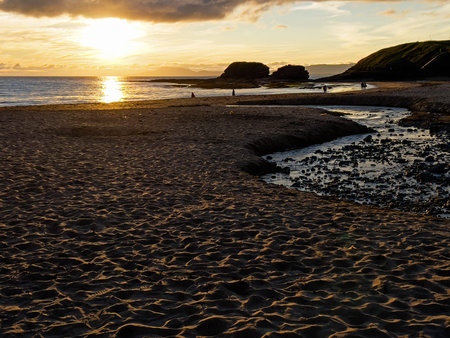 Sandy beach on sunset in Bundoran town, Co Donegal, Ireland
