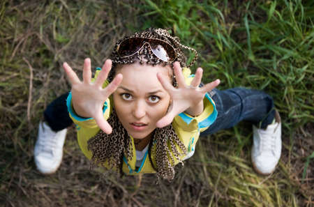 look down on beauty girl who requests helpの写真素材