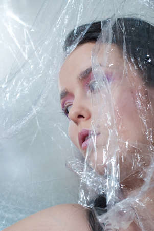 face of beauty young girl on the silver backgroundの写真素材