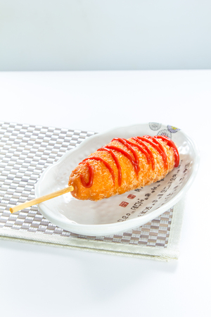 A photo of deep fried sausageの写真素材
